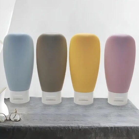 4pcs/set Travel Bottles Set, Refillable Cosmetic Containers Empty Shampoo Shower Gel Tubes For Toiletries Shampoo And Body Wash Liquid Travel Bottles Lotion Sub Bottle Squeezable Containers 60ml(blue, gray, yellow, and pink)